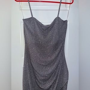 Worn once, sparkly, gray, stretchy flexible material, unaltered